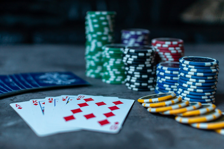 poker hand and chips